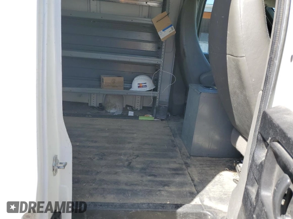 2012 Chevrolet Express Cargo z VIN 1GCWGFCA1C1193688, wystawiony jako Copart lot #54392185 z przebiegiem 133 617 mil mil oraz Szkoda całkowita • Salvage title. Historia ofert i sprzedaży dostępna na DreamBid. Obrazek 11.