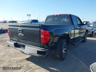 2015 Chevrolet Silverado 1500 LS with VIN 1GCRCPEC7FZ219570, listed as a IAAI auction lot 40565238 with 136,173 mi miles. Bid and sale history available at carsss.com. Image 4.