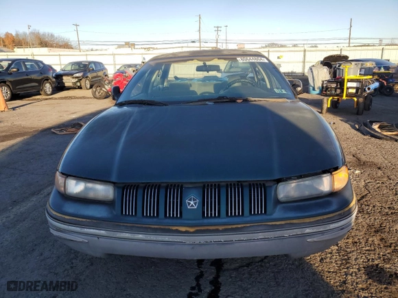 1993 Chrysler Concorde with VIN 2C3EL56T9PH636017, listed as a Copart auction lot 80644804 with 124,677 mi miles and Salvage Title. Bid and sale history available at carsss.com. Image 5.
