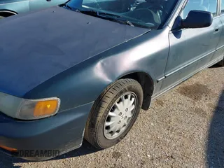 1996 Honda Accord EX w/Leather with VIN 1HGCD566XTA251134, listed as a IAAI auction lot 41461247 with 230,793 mi miles. Bid and sale history available at carsss.com. Image 6.