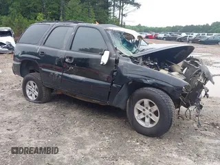 2005 Chevrolet Tahoe LS z VIN 1GNEK13T85J163208, wystawiony jako IAAI lot #40130206 z przebiegiem Nie podano mil oraz . Historia ofert i sprzedaży dostępna na DreamBid. Obrazek 1.