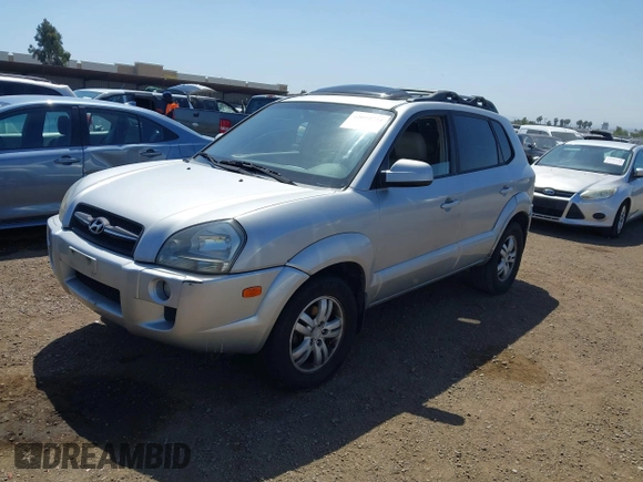2007 Hyundai Tucson SE with VIN KM8JN12D07U632975, listed as a IAAI auction lot 42099734 with 154,320 mi miles. Bid and sale history available at carsss.com. Image 2.