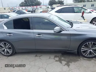 2018 Infiniti Q50 Luxe with VIN JN1EV7AP7JM354543, listed as a IAAI auction lot 42189356 with 89,503 mi miles and . Bid and sale history available at DreamBid. Image 14.