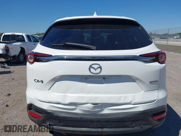 2020 Mazda CX-9 Touring with VIN JM3TCACY6L0403584, listed as a IAAI auction lot 41784589 with 55,328 mi miles and . Bid and sale history available at DreamBid. Image 6.