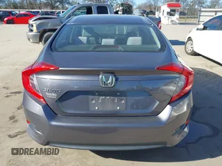 2017 Honda Civic LX z VIN 19XFC2F58HE012626, wystawiony jako IAAI lot #41458898 z przebiegiem 120 354 mil mil oraz . Historia ofert i sprzedaży dostępna na DreamBid. Obrazek 16.