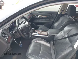 2015 Infiniti Q70 with VIN JN1BY1PRXFM832185, listed as a IAAI auction lot 41801058 with 101,503 mi miles and . Bid and sale history available at DreamBid. Image 5.