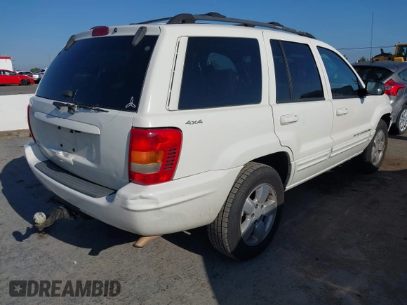 2001 Jeep Grand Cherokee Limited with VIN 1J4GW58S41C615418, listed as a IAAI auction lot 42141143 with 148,145 mi miles. Bid and sale history available at carsss.com. Image 4.