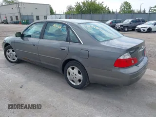 2004 Toyota Avalon XL with VIN 4T1BF28B14U380288, listed as a IAAI auction lot 42228778 with 321,988 mi miles and . Bid and sale history available at carsss.com. Image 3.