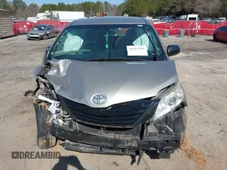 2015 Toyota Sienna L with VIN 5TDZK3DC4FS669496, listed as a IAAI auction lot 41691430 with 119,427 mi miles. Bid and sale history available at carsss.com. Image 13.