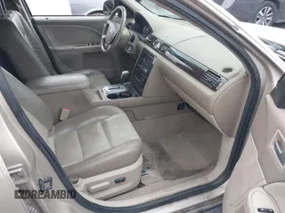 2005 Mercury Montego Luxury z VIN 1MEFM40185G611793, wystawiony jako IAAI lot #41125667 z przebiegiem Nie podano mil oraz . Historia ofert i sprzedaży dostępna na DreamBid. Obrazek 5.
