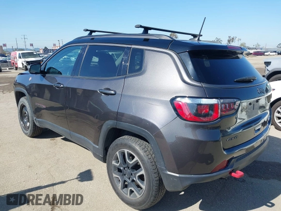 2019 Jeep Compass Trailhawk with VIN 3C4NJDDB3KT759849, listed as a IAAI auction lot 42141467 with 100,915 mi miles and . Bid and sale history available at DreamBid. Image 3.