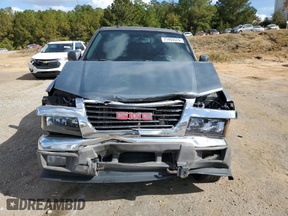 2009 GMC Canyon Work Truck with VIN 1GTDT19E698142512, listed as a Copart auction lot 77493574 with 0 mi miles and Salvage Title. Bid and sale history available at carsss.com. Image 5.