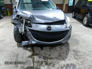 2013 Mazda 5 Sport with VIN JM1CW2BL5D0156684, listed as a IAAI auction lot 41966696 with 121,654 mi miles and . Bid and sale history available at DreamBid. Image 6.