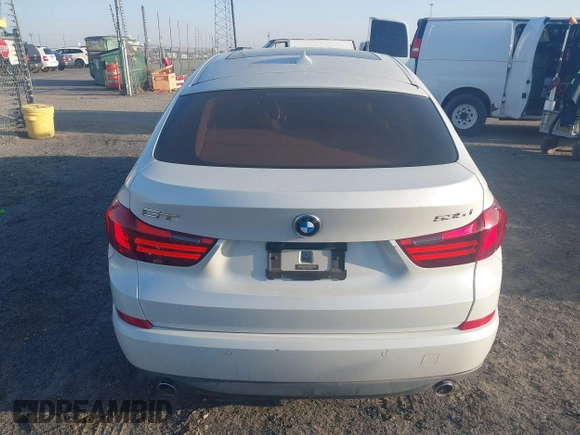 2015 BMW 5 Series 535i Gran Turismo with VIN WBA5M2C51FD872215, listed as a IAAI auction lot 41787558 with 96,768 mi miles and . Bid and sale history available at DreamBid. Image 16.