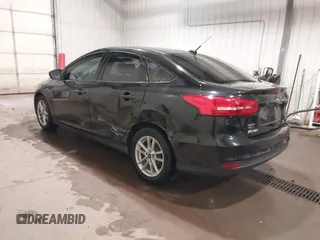 2015 Ford Focus SE with VIN 1FADP3F29FL203084, listed as a IAAI auction lot 42357973 with 99,002 mi miles and . Bid and sale history available at DreamBid. Image 3.