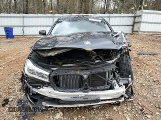 2016 BMW 7 Series 750i with VIN WBA7F0C55GGM20825, listed as a Copart auction lot 47743955 with 0 mi miles and Salvage Title. Bid and sale history available at carsss.com. Image 5.