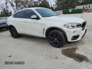 2015 BMW X6 xDrive50i with VIN 5UXKU6C55F0F94151, listed as a Copart auction lot 46826775 with 129,925 mi miles and Salvage Title. Bid and sale history available at carsss.com. Image 4.