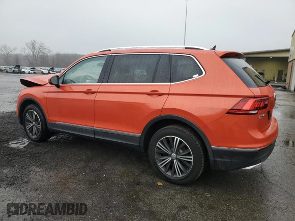 2019 Volkswagen Tiguan SE with VIN 3VV2B7AX7KM013949, listed as a Copart auction lot 51662645 with 74,039 mi miles and Salvage Title. Bid and sale history available at DreamBid. Image 2.