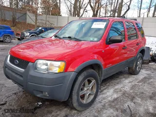 2002 Ford Escape Limited with VIN 1FMCU04132KB53687, listed as a IAAI auction lot 41468556 with 63,875 mi miles. Bid and sale history available at carsss.com. Image 2.