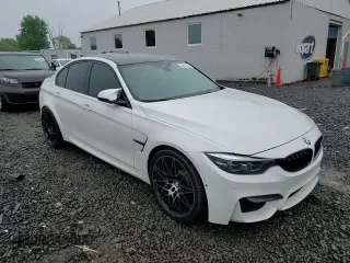 2018 BMW M3 z VIN WBS8M9C5XJ5L71702, wystawiony jako Copart lot #55657055 z przebiegiem Nie podano mil oraz Szkody całkowita. Historia ofert i sprzedaży dostępna na DreamBid. Obrazek 13.