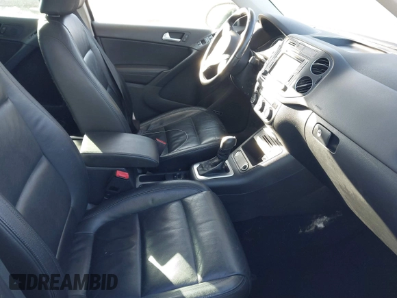 2016 Volkswagen Tiguan S with VIN WVGBV7AX9GW616488, listed as a IAAI auction lot 41402119 with 66,288 mi miles and . Bid and sale history available at DreamBid. Image 5.