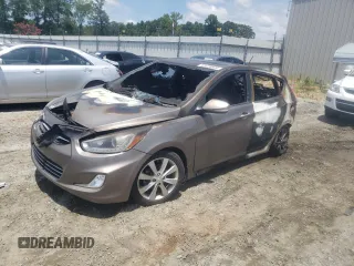 2014 Hyundai Accent SE with VIN KMHCU5AEXEU159810, listed as a Copart auction lot 61634604 with 0 mi miles and Salvage Title. Bid and sale history available at carsss.com. Image 1.