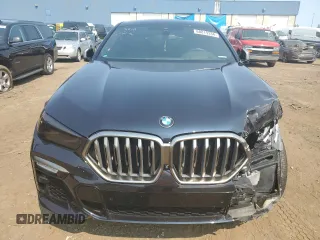 2021 BMW X6 M50i with VIN 5UXCY8C04M9E36899, listed as a Copart auction lot 68819334 with 72,808 mi miles and Salvage Title. Bid and sale history available at carsss.com. Image 5.