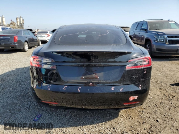 2016 Tesla Model S 90D with VIN 5YJSA1E20GF169954, listed as a Copart auction lot 61974475 with 124,560 mi miles and Salvage title. Bid and sale history available at DreamBid. Image 6.