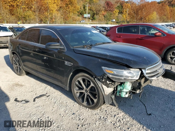 2015 Ford Taurus SEL z VIN 1FAHP2E85FG151155, wystawiony jako Copart lot #77791634 z przebiegiem 224 144 mil mil oraz Szkody całkowita. Historia ofert i sprzedaży dostępna na DreamBid. Obrazek 4.