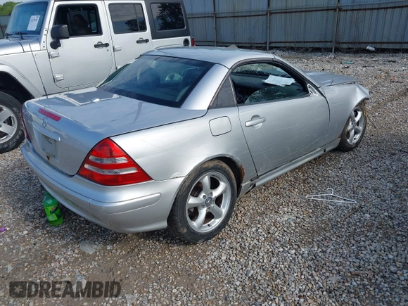 2001 Mercedes-Benz SLK 230/320 with VIN WDBKK65F81F191120, listed as a IAAI auction lot 42173910 with 128,035 mi miles and . Bid and sale history available at DreamBid. Image 4.