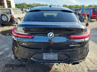 2021 BMW X4 M40i with VIN 5UX2V5C05M9F68427, listed as a Copart auction lot 64941095 with 50,208 mi miles and Salvage title. Bid and sale history available at DreamBid. Image 6.