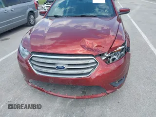 2014 Ford Taurus SEL z VIN 1FAHP2E82EG157445, wystawiony jako IAAI lot #42133676 z przebiegiem 174 616 mil mil oraz . Historia ofert i sprzedaży dostępna na DreamBid. Obrazek 6.