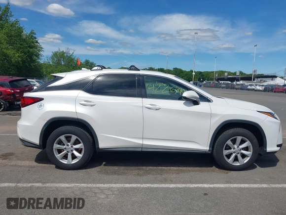 2016 Lexus RX 350 z VIN 2T2BZMCA1GC018531, wystawiony jako IAAI lot #42267497 z przebiegiem 182 473 mil mil oraz . Historia ofert i sprzedaży dostępna na DreamBid. Obrazek 13.