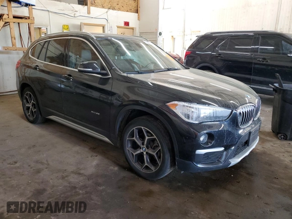 2018 BMW X1 xDrive28i with VIN WBXHT3C31J5L24230, listed as a Copart auction lot 56665305 with Not provided miles and Non repairable. Bid and sale history available at DreamBid. Image 4.