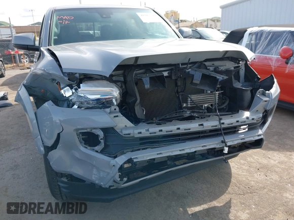 2020 Toyota Tacoma SR5 with VIN 5TFAZ5CN6LX089275, listed as a IAAI auction lot 41987526 with 51,661 mi miles and . Bid and sale history available at DreamBid. Image 6.