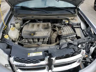 2013 Dodge Avenger SXT z VIN 1C3CDZCB0DN548175, wystawiony jako Copart lot #56795655 z przebiegiem 128 460 mil mil oraz Szkoda całkowita • Salvage title. Historia ofert i sprzedaży dostępna na DreamBid. Obrazek 11.