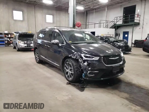 2021 Chrysler Pacifica Limited z VIN 2C4RC3GG1MR595214, wystawiony jako Copart lot #84169164 z przebiegiem 30 737 mil mil oraz Szkoda całkowita • Salvage title. Historia ofert i sprzedaży dostępna na DreamBid. Obrazek 11.