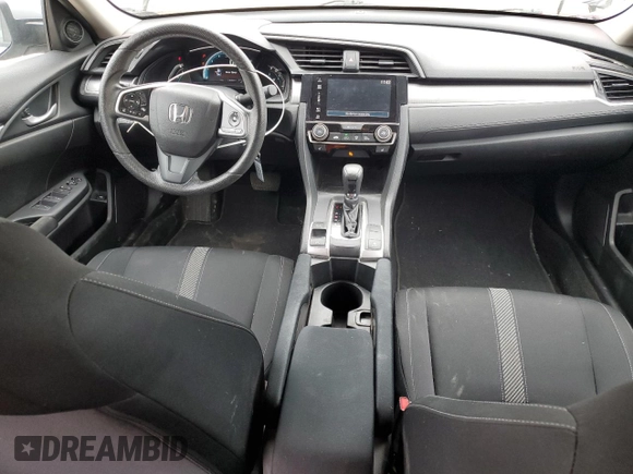 2017 Honda Civic LX z VIN 2HGFC2F51HH011825, wystawiony jako Copart lot #56276965 z przebiegiem 136 266 mil mil oraz Szkoda całkowita • Salvage title. Historia ofert i sprzedaży dostępna na DreamBid. Obrazek 8.
