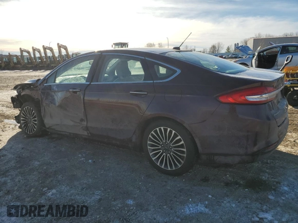 2017 Ford Fusion SE with VIN 3FA6P0HDXHR211897, listed as a Copart auction lot 83514654 with 128,914 mi miles and Salvage Title. Bid and sale history available at DreamBid. Image 2.