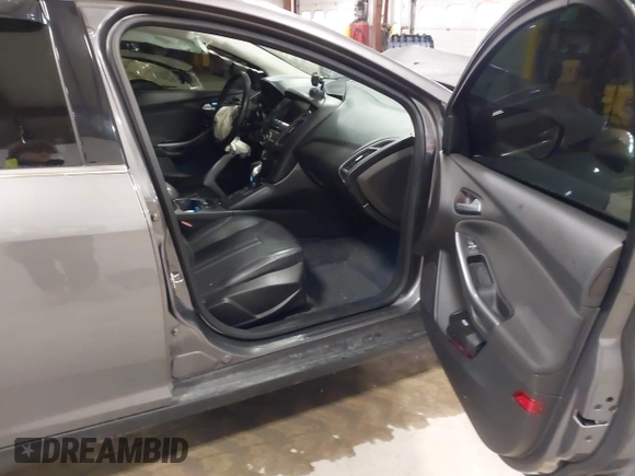 2012 Ford Focus Titanium with VIN 1FAHP3N27CL313288, listed as a IAAI auction lot 41741895 with 140,376 mi miles and . Bid and sale history available at carsss.com. Image 5.