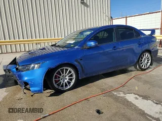 2015 Mitsubishi Lancer Evolution GSR with VIN JA32W8FV6FU006930, listed as a Copart auction lot 84628474 with 116,819 mi miles and Salvage Title. Bid and sale history available at carsss.com. Image 1.