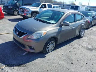 2012 Nissan Versa SV with VIN 3N1CN7AP1CL818558, listed as a IAAI auction lot 41592287 with 163,309 mi miles. Bid and sale history available at carsss.com. Image 2.