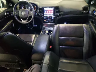 2019 Jeep Grand Cherokee High Altitude with VIN 1C4RJFCG7KC679170, listed as a Copart auction lot 65853304 with 60,730 mi miles and Salvage Title. Bid and sale history available at carsss.com. Image 8.