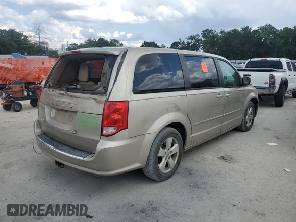 2013 Dodge Grand Caravan SE with VIN 2C4RDGBG3DR693415, listed as a Copart auction lot 54848235 with 114,063 mi miles and Salvage Title. Bid and sale history available at DreamBid. Image 3.