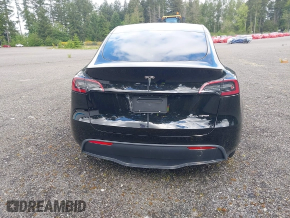 2023 Tesla Model Y Long Range z VIN 7SAYGDEE2PF885116, wystawiony jako IAAI lot #40091902 z przebiegiem 11 779 mil mil oraz . Historia ofert i sprzedaży dostępna na DreamBid. Obrazek 16.