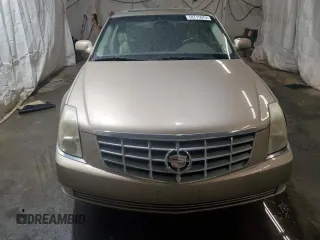 2006 Cadillac DTS 1SC z VIN 1G6KD57Y76U141402, wystawiony jako Copart lot #58715675 z przebiegiem 148 042 mil mil oraz Szkoda całkowita • Salvage title. Historia ofert i sprzedaży dostępna na DreamBid. Obrazek 5.