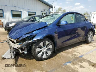 2022 Tesla Model Y Long Range z VIN 7SAYGDEE8NF447410, wystawiony jako Copart lot #54860765 z przebiegiem Nie podano mil oraz Szkody całkowita. Historia ofert i sprzedaży dostępna na DreamBid. Obrazek 1.