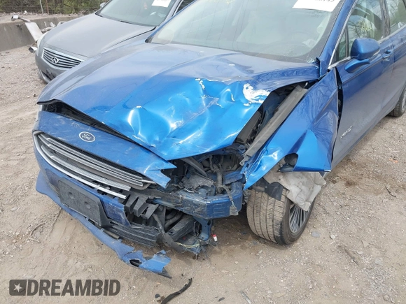 2017 Ford Fusion Hybrid Titanium с VIN 3FA6P0RU5HR388615, выставлен на аукционе IAAI как лот 42066142 с пробегом 121 618 миль миль и . История ставок и продаж доступна на DreamBid. Изображение 6.