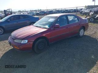 1995 Honda Accord LX with VIN JHMCD5634SC060105, listed as a IAAI auction lot 42111394 with 217,635 mi miles and . Bid and sale history available at carsss.com. Image 2.