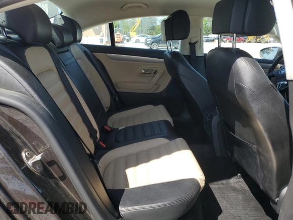 2013 Volkswagen CC Sport Plus z VIN WVWBP7AN7DE515951, wystawiony jako Copart lot #52251575 z przebiegiem 121 414 mil mil oraz Szkody całkowita. Historia ofert i sprzedaży dostępna na DreamBid. Obrazek 10.